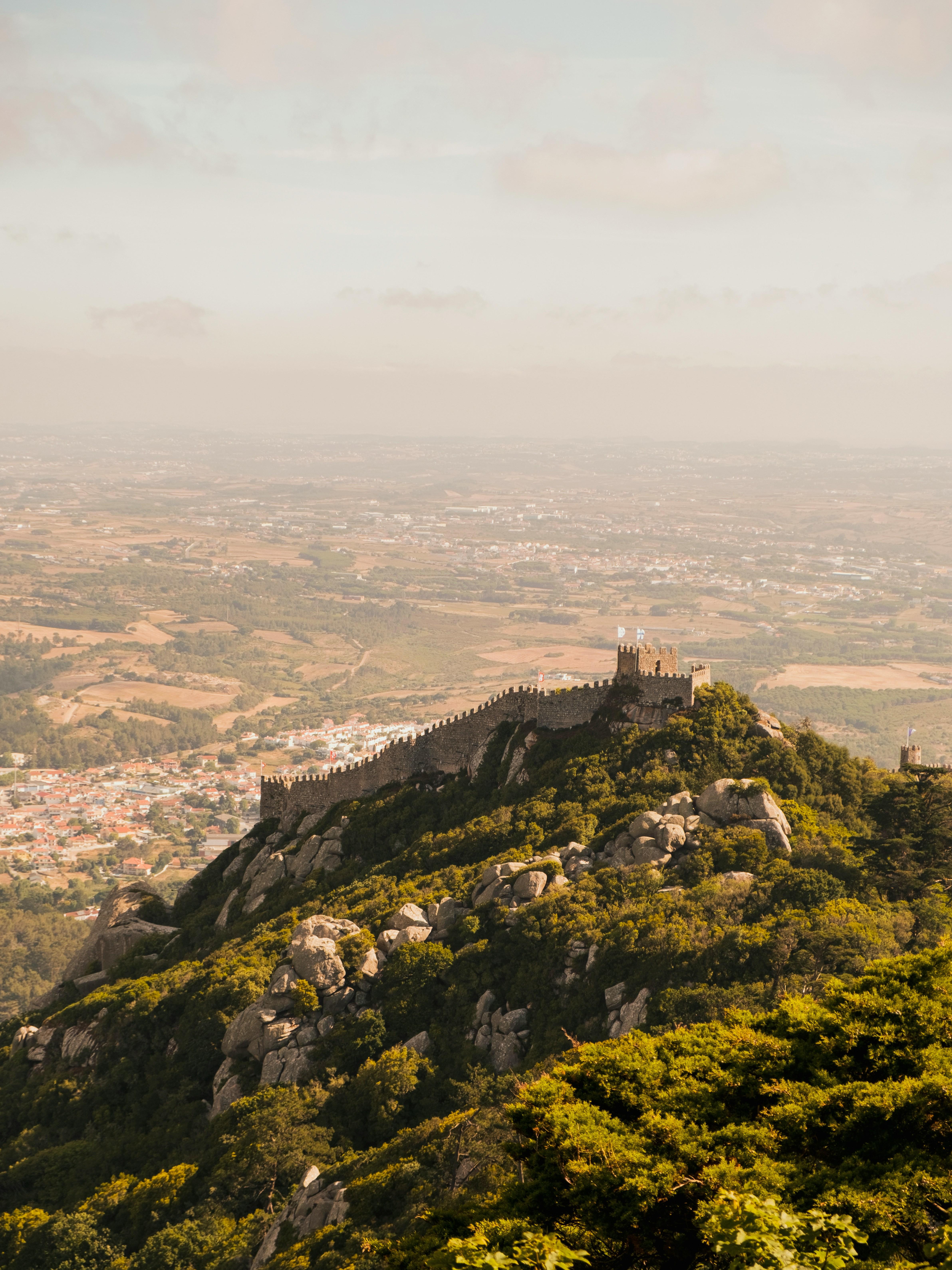 Ancient Moorish castle walls along a forested hilltop in Sintra