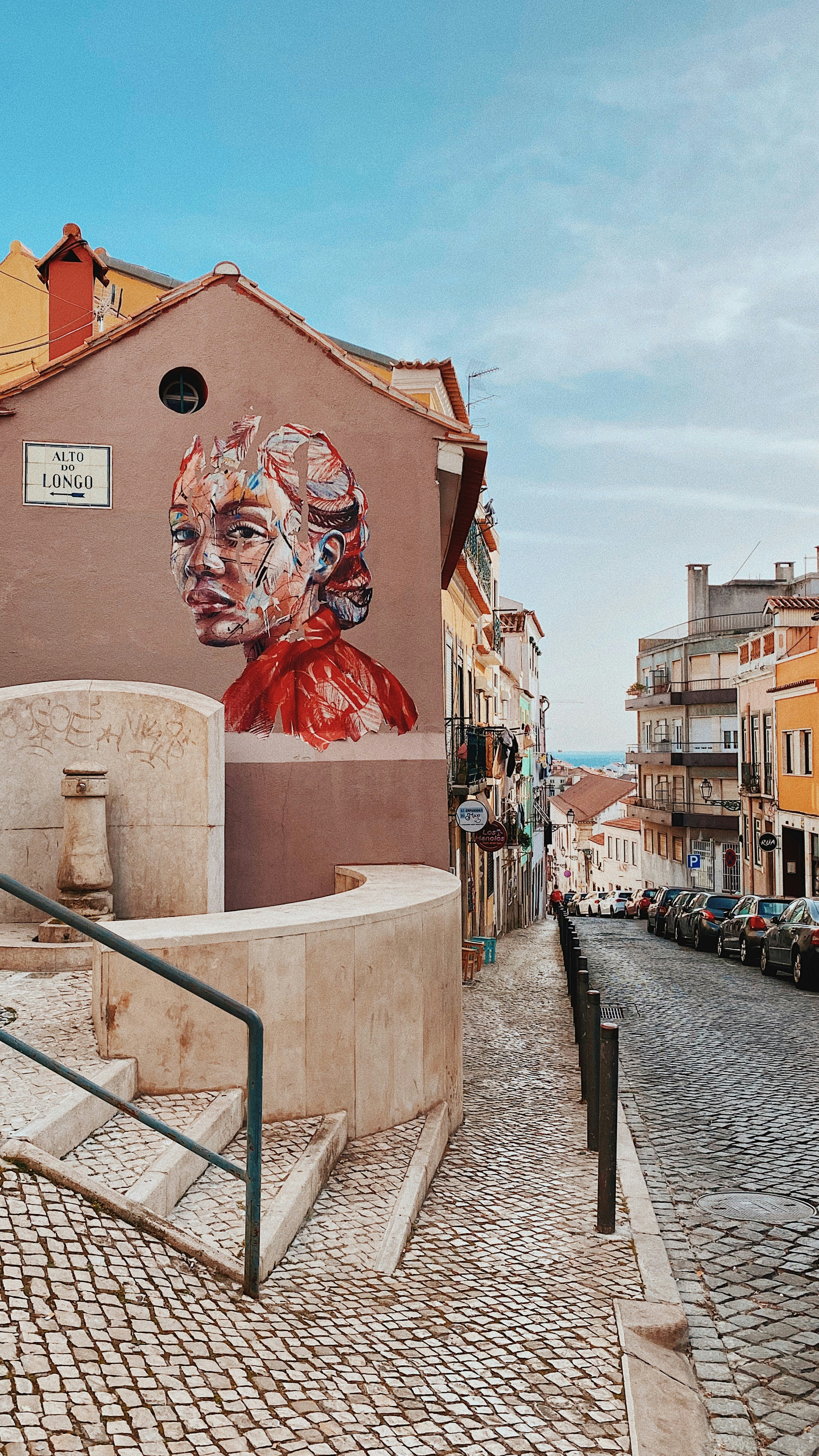 Colorful street art mural on a Lisbon building
